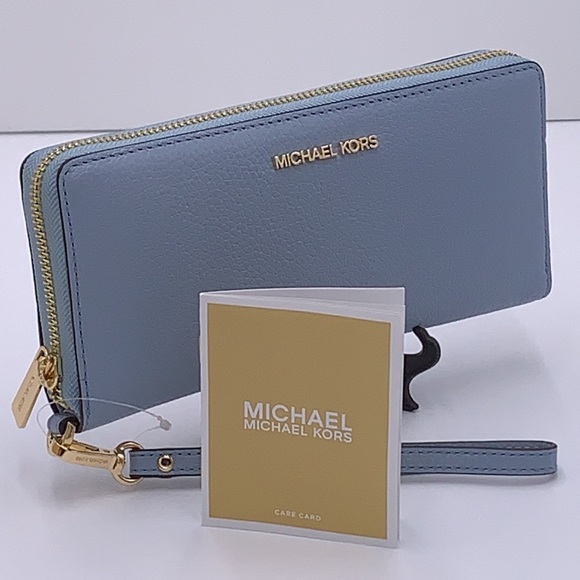 MICHAEL KORS LARGE TRAVEL CONTINENTAL WRISTLET WALLET PALE BLUE COLOR
NWT - Picture 2 of 16